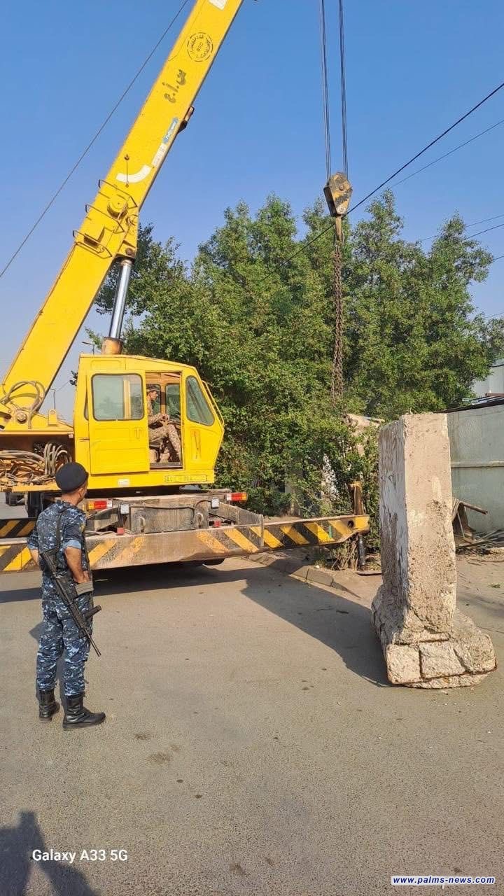 عمليات بغداد ترفع الكتل الكونكريتية وتفتح الطريق المجاور للسفارة البابوية في الكرادة